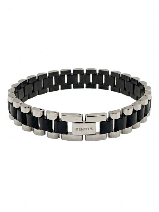 Executive Two-Tone Bracelet in black and steel, laid in a circle on a white background with the IDENTITY. plate at the centre