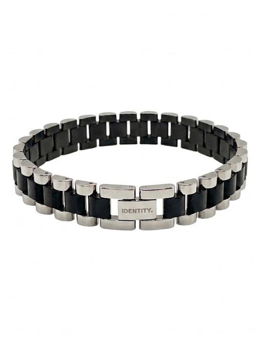Executive Two-Tone Bracelet in black and steel, laid in a circle on a white background with the IDENTITY. plate at the centre