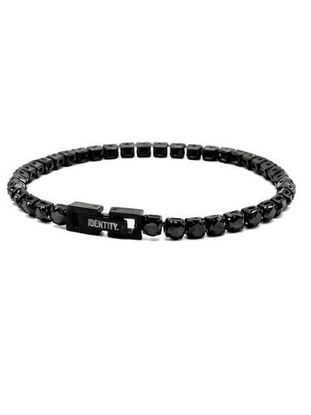 Origin Black Tennis Bracelet laid in a circle on a white background, with the IDENTITY. plate at the clasp